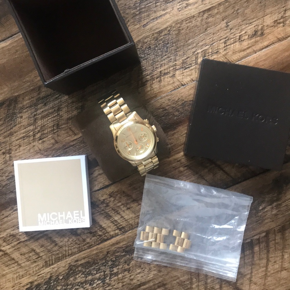 Gold MK watch